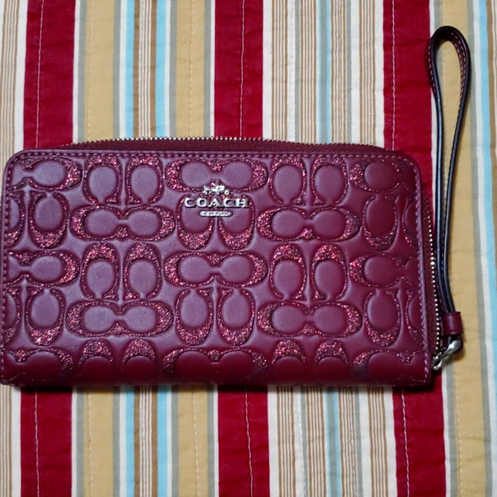 Coach wristlet small,  wine color